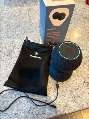 Therabody WaveDuo Massage Device - Black with Teal Logo Accent